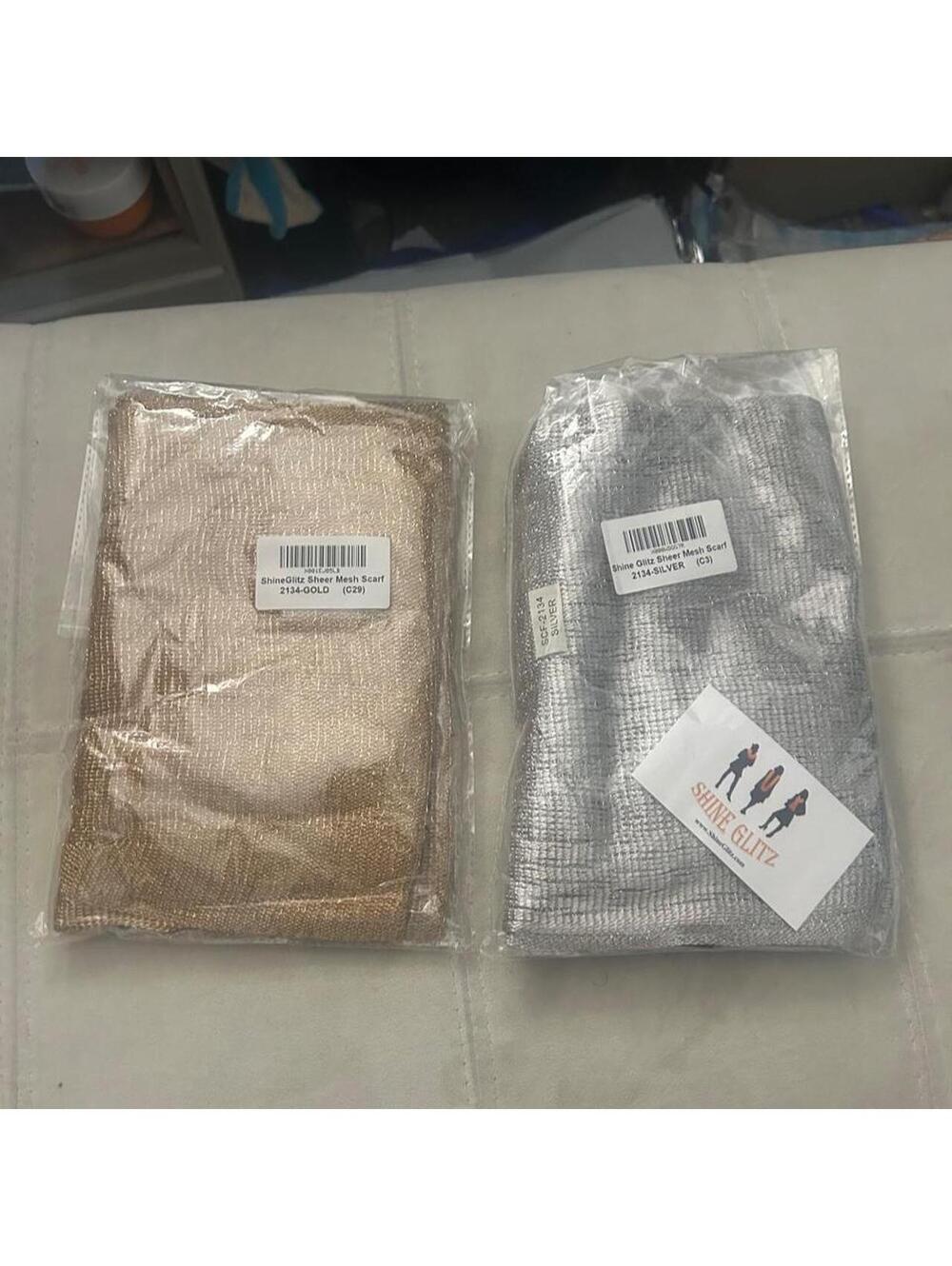 New in the package Set of 2 Shine Glitz silver and gold mesh metallic scarves